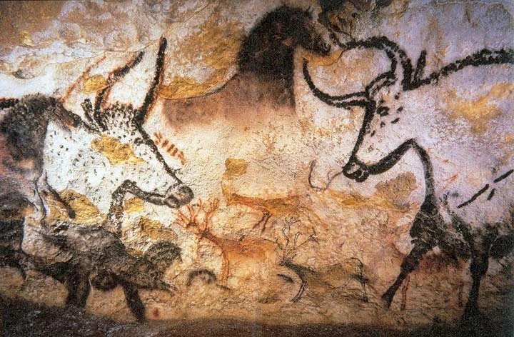 Aurochs, horses and deer painted on the cave wall at Lascaux
